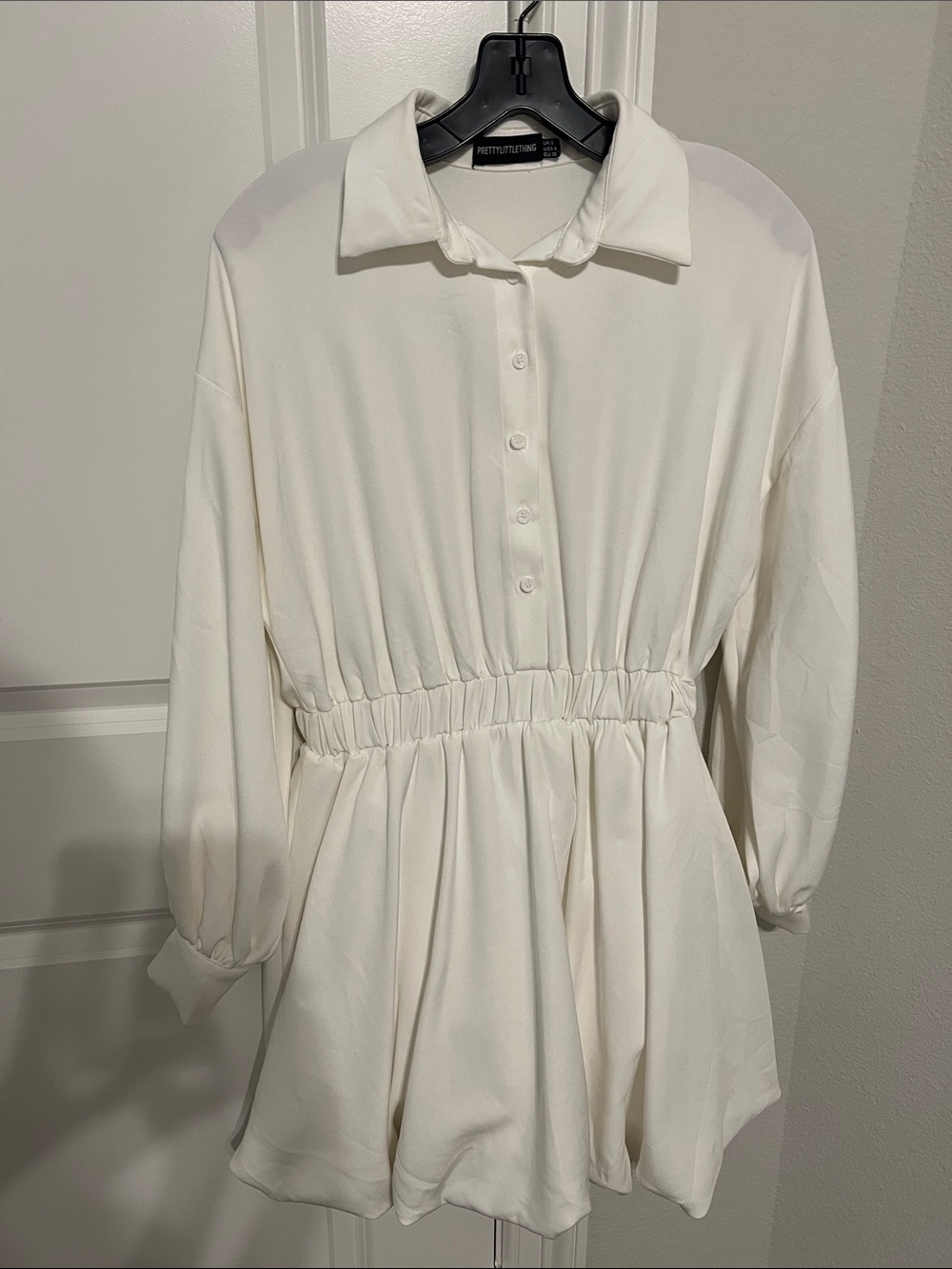 PrettyLittleThing Cream Long Sleeve Bubble Hem Mini Dress